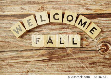 Welcome Fall message alphabet letter on wooden background 78187819