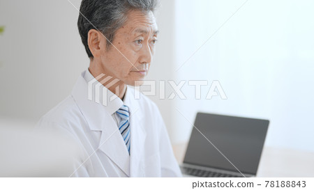 Elderly male doctor with a rugged look Elderly male doctor with a rugged look 78188843