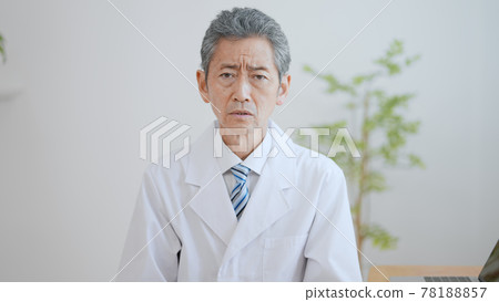 Elderly male doctor with a rugged look Elderly male doctor with a rugged look 78188857