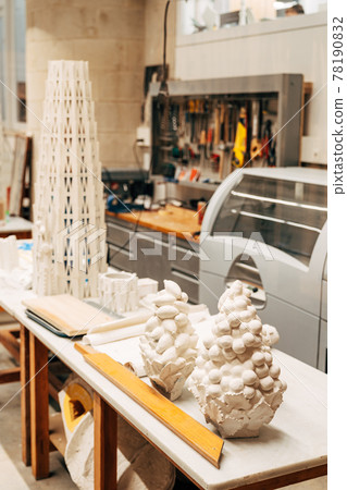 Barcelona, Spain - 15 December 2019: Architect's workshop in Sagrada Familia. Desktops and papier-mache with images. 78190832