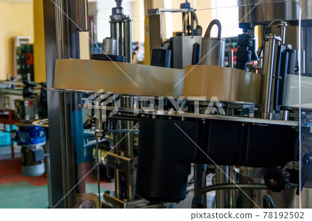 Automatic labeling machine equipment at winery 78192502