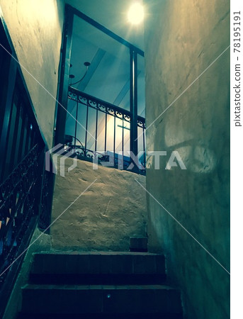 Dim blue light stair corner Dim blue light stair corner 78195191