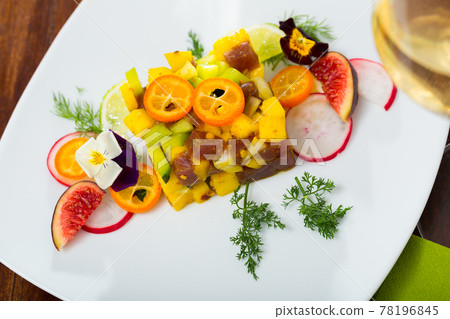 Fresh tuna tartare with avocado and mango Fresh tuna tartare with avocado and mango 78196845