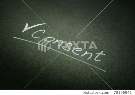Handwritten consent word on the dark page. Handwritten consent word on the dark page. 78196941