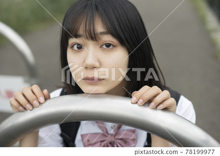 High school girl going to and from school High school girl going to and from school 78199977