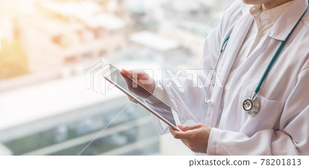 Medical doctor with telehealth consulting patient health online using mobile digital tablet for telemedicine in hospital for professional emergency tele-medicine healthcare assistance service Medical doctor with telehealth consulting patient health online using mobile digital tablet for telemedicine in hospital for professional emergency tele-medicine healthcare assistance service 78201813