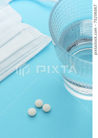 Pills with mask and pills with water 78206867
