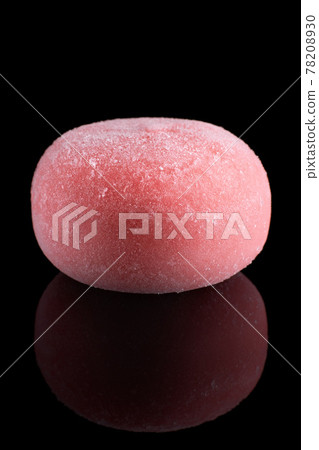 Wagashi Mochi with Pomegranate with honey on black background. 78208930