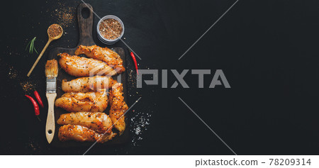 Raw chicken breast marinated with spices 78209314