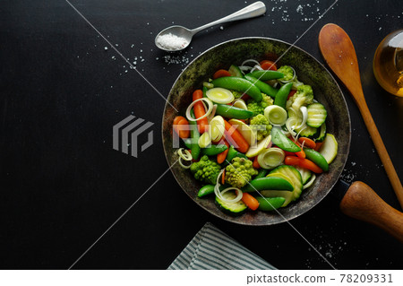 Vegan vegetables on pan on table Vegan vegetables on pan on table 78209331