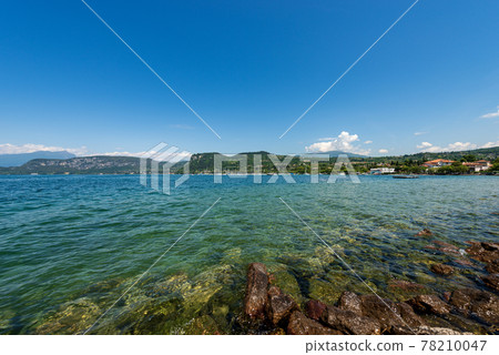 Lake Garda - Beautiful bay in front of the Small Village of Bardolino Veneto Italy Lake Garda - Beautiful bay in front of the Small Village of Bardolino Veneto Italy 78210047