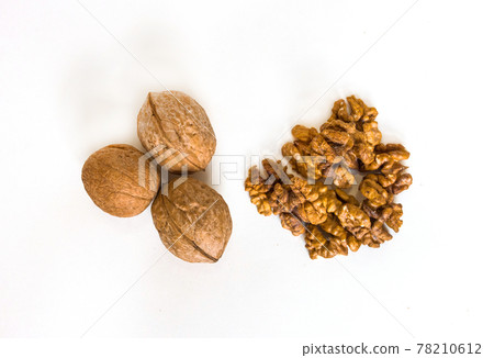 Walnuts isolated on white background, selective focus 78210612
