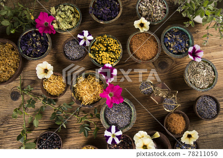 Natural remedy, healing herbs background Natural remedy, healing herbs background 78211050