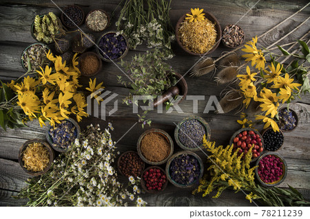 Natural medicine, wooden table background Natural medicine, wooden table background 78211239