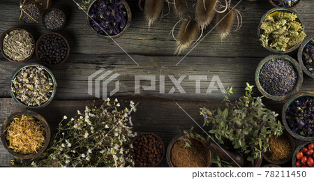 Fresh medicinal herbs on wooden background Fresh medicinal herbs on wooden background 78211450