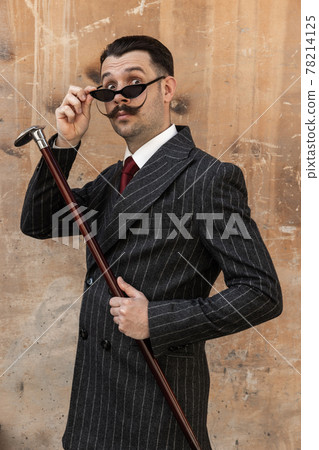 Portrait of young man in the image of greatest painter, artist isolated on light background. Retro style, comparison of eras concept. Portrait of young man in the image of greatest painter, artist isolated on light background. Retro style, comparison of eras concept. 78214125