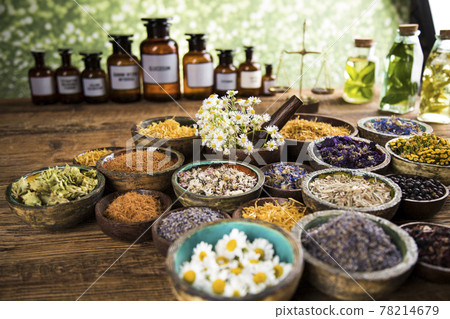 Natural medicine, wooden table background Natural medicine, wooden table background 78214679