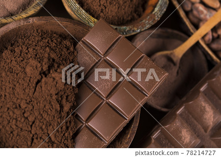 Chocolate sweet, cocoa pod and food dessert background Chocolate sweet, cocoa pod and food dessert background 78214727