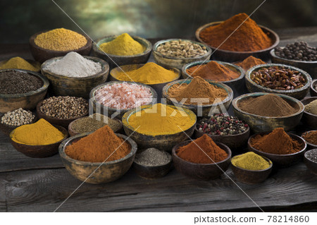 Aromatic spices on wooden background 78214860