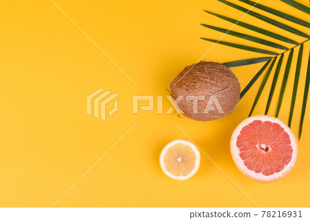 Beach accessories with shells and sea stars on a colored background 78216931