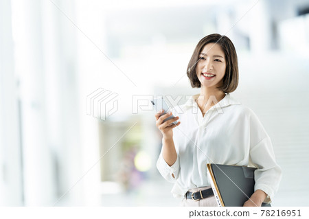 Female employee Business woman Business image Woman working computer 78216951