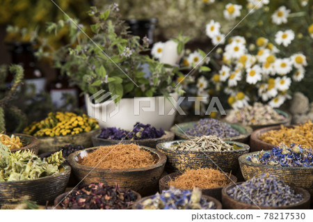 Natural medicine, wooden table background Natural medicine, wooden table background 78217530