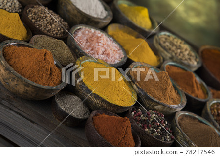 Colorful spices in bowl background Colorful spices in bowl background 78217546