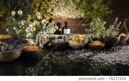 Black mirror background, Natural remedy, healing herbs Black mirror background, Natural remedy, healing herbs 78217810