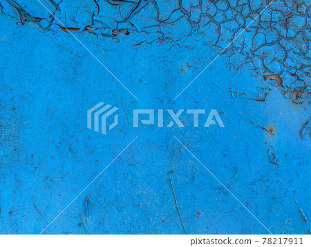 Surface texture of old scratched crumpled blue iron gritted metal painted with blue paint. The background 78217911