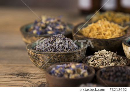 Natural remedy, healing herbs background Natural remedy, healing herbs background 78218662
