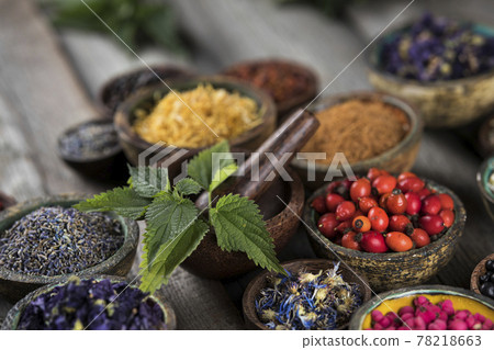 Natural remedy, healing herbs background Natural remedy, healing herbs background 78218663