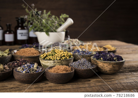 Natural medicine, wooden table background Natural medicine, wooden table background 78218686
