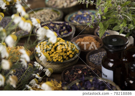 Homeopathy, herbal medicine on wooden table 78218886