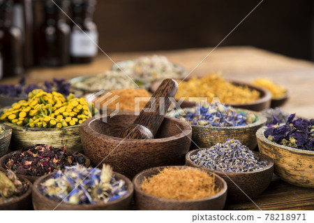 Natural medicine and mortar, healing herbs background 78218971