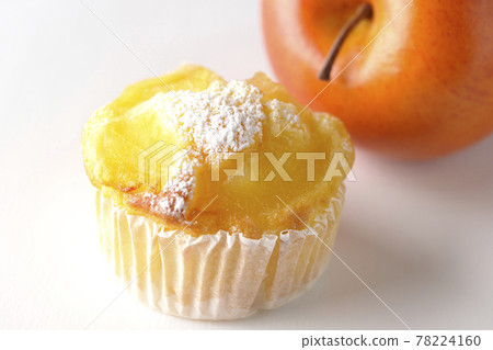 Photographed apple muffins on a white background 78224160