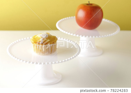 Cake stand and apple muffins Cake stand and apple muffins 78224283
