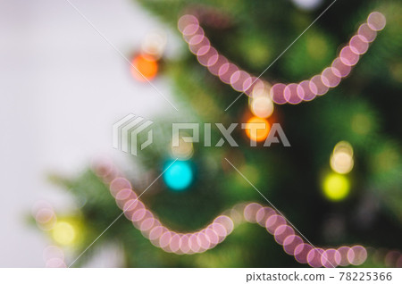 Defocused christmas background. Christimas tree, decoration and lights 78225366
