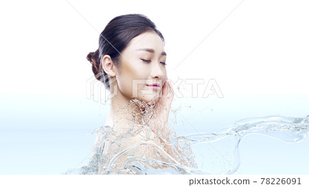 asian woman touching face eyes closed with splashing water on face and body asian woman touching face eyes closed with splashing water on face and body 78226091