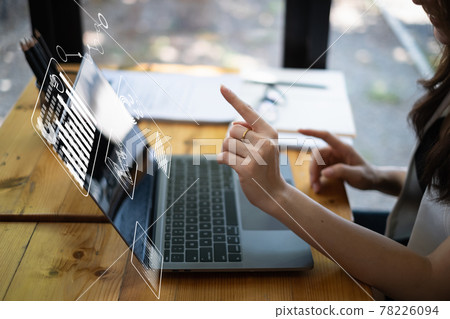 Fund managers researching and analysis Investment stock market by paperwork document with virtual financial on screen . business finance concept. 78226094