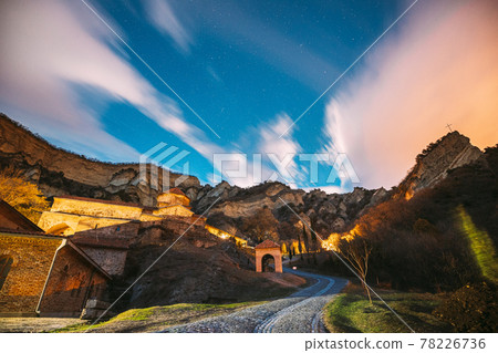 Mtskheta, Georgia. Medieval Monastic Shio-Mgvime Monastery Shiomgvime Complex Under Autumn Night Starry Sky With Glowing Stars Above Famous Place In Limestone Canyon Mtskheta, Georgia. Medieval Monastic Shio-Mgvime Monastery Shiomgvime Complex Under Autumn Night Starry Sky With Glowing Stars Above Famous Place In Limestone Canyon 78226736
