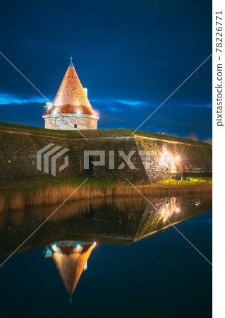 Kuressaare, Saaremaa Island, Estonia. Episcopal Castle In Evening Blue Hour Night. Traditional Medieval Architecture, Famous Attraction Landmark. Old Tower Kuressaare, Saaremaa Island, Estonia. Episcopal Castle In Evening Blue Hour Night. Traditional Medieval Architecture, Famous Attraction Landmark. Old Tower 78226771