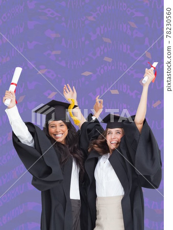 Composition of two happy diverse female students with certificates in graduation hats on purple 78230560
