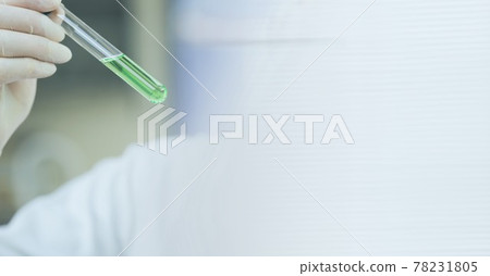 Composition of scientist holding test tube with green liquid and copy space Composition of scientist holding test tube with green liquid and copy space 78231805
