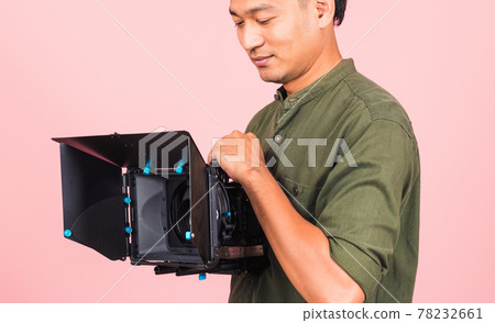 adult man confident professional videographer handheld holding digital video camera adult man confident professional videographer handheld holding digital video camera 78232661