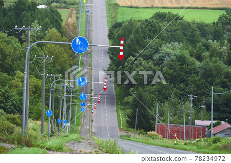 Road with pedestrian priority signs (Hokkaido) 78234972