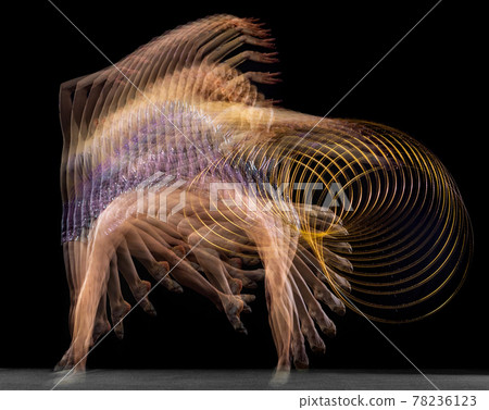 Portrait of young girl rhythmic gymnast in motion and action isolated in mixed light on dark background. Portrait of young girl rhythmic gymnast in motion and action isolated in mixed light on dark background. 78236123