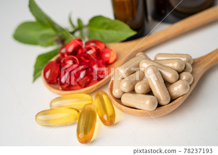 Alternative medicine herbal organic capsule with vitamin E omega 3 fish oil, mineral, drug with herbs leaf natural supplements for healthy good life.. 78237193
