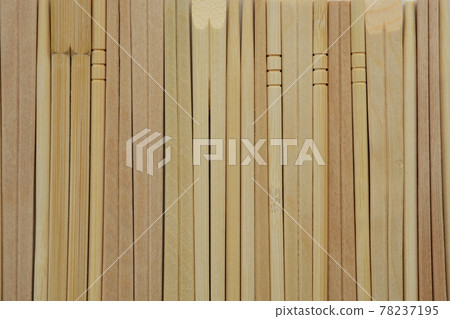 Background material with disposable chopsticks lined up 78237195