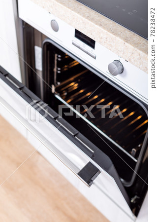 Opened oven in kitchen interior, nobody 78238472