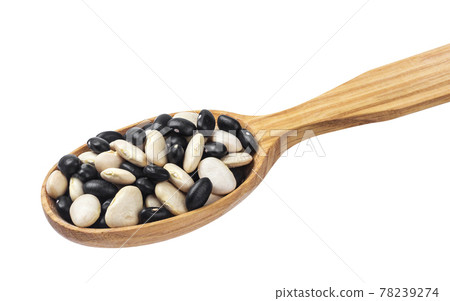 Mixed black and white kidney beans in wooden spoon isolated on white Mixed black and white kidney beans in wooden spoon isolated on white 78239274